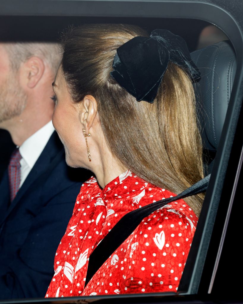 The Princess of Wales looking to side with bow in hair