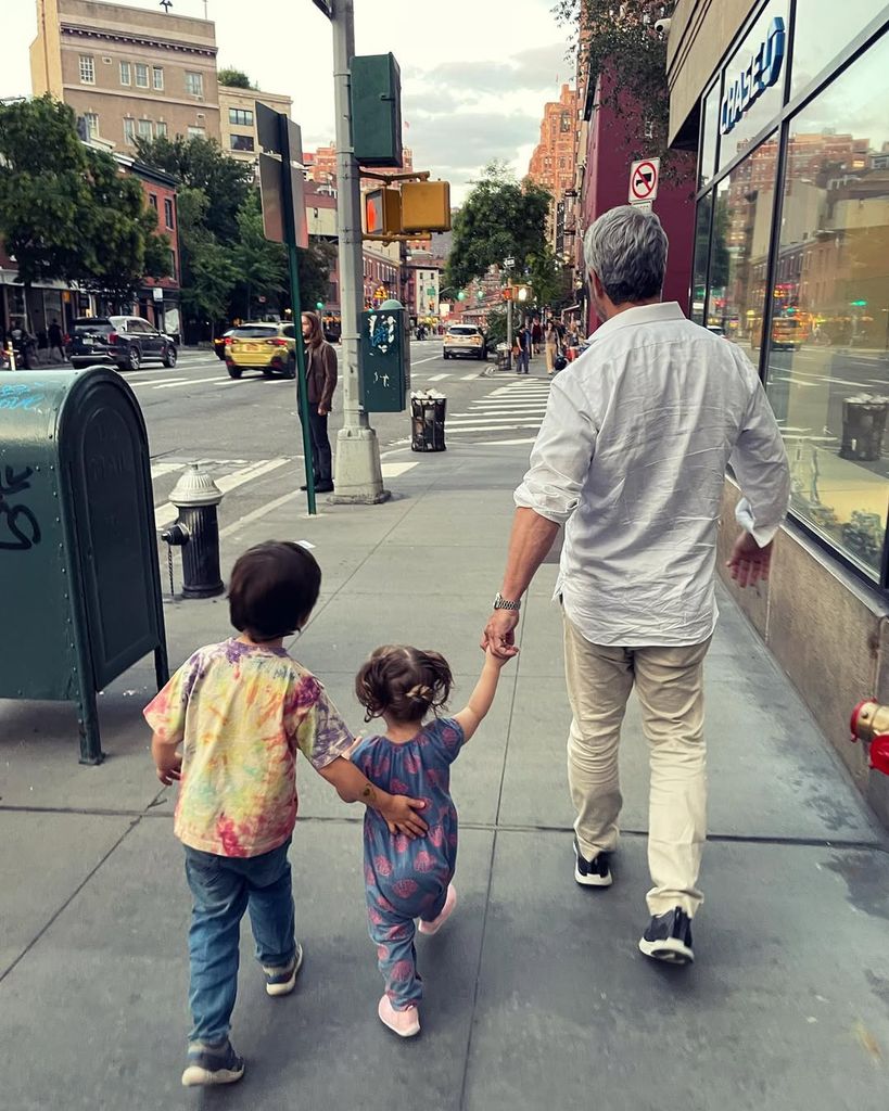 Andy and his kids walking in NYC