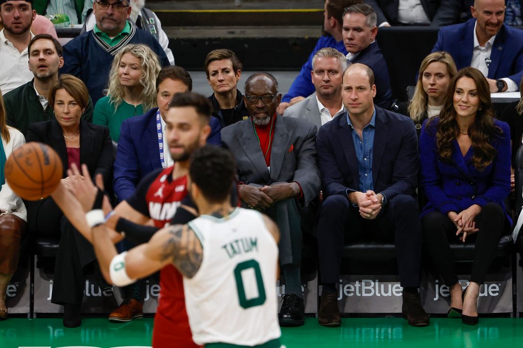 Prince William and Princess Kate watching a basketball game