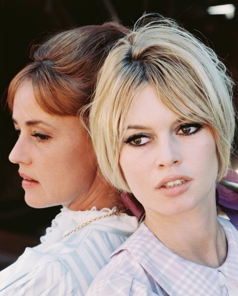 Jeanne Moreau and Brigitte Bardot in a publicity still issued for the film, 'Viva Maria!', 1965. 