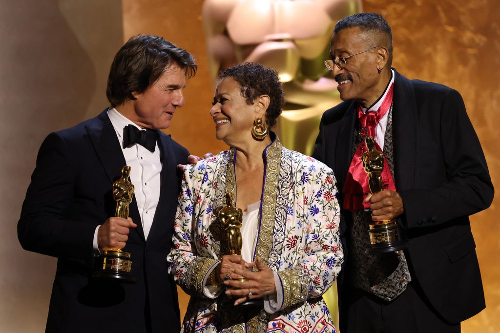 Tom Cruise, dancer Debbie Allen and production designer Wynn Thomas pose with their Honorary Academy Awards 
