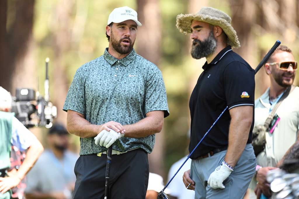 photo of travis kelce and jason kelce on the golf course