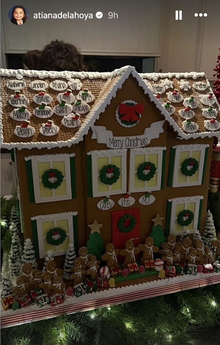 Travis' stepdaughter Atiana shared a photo of the family gingerbread house 