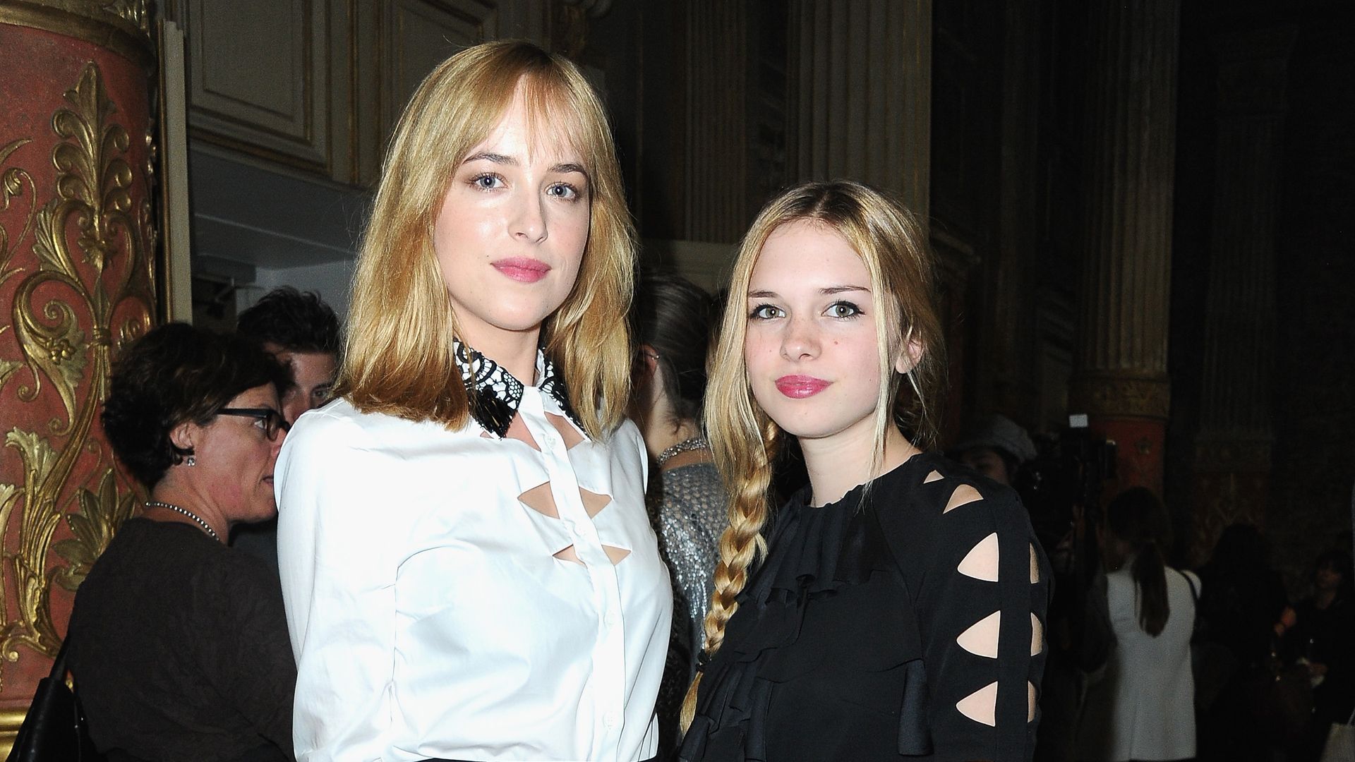 photo of dakota johnson and stella banderas paris fashion week