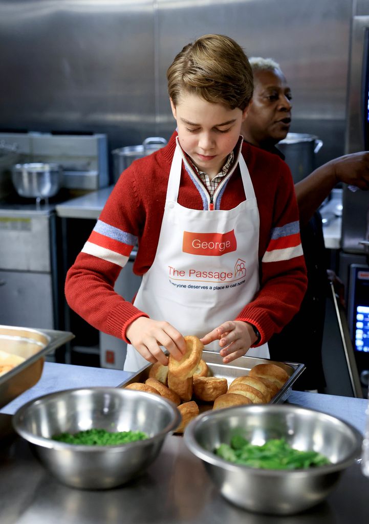 Prince George handling Yorkshire puddings at a homeless shelter