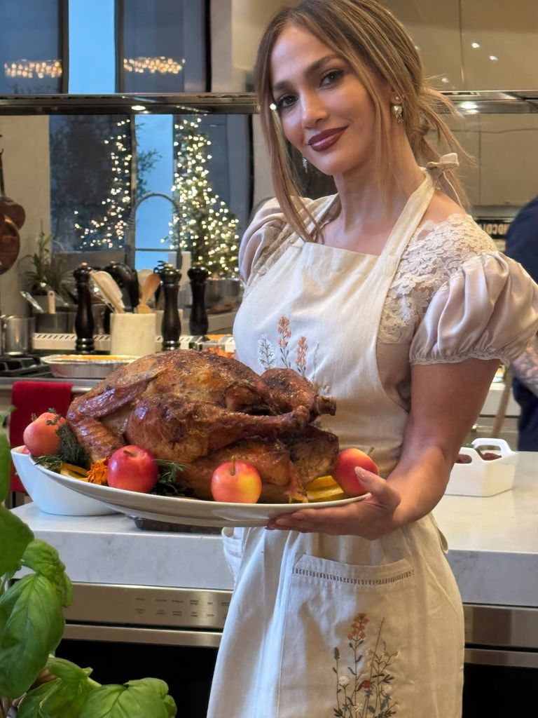 Jennifer Lopez posing in Chloé dress with turkey