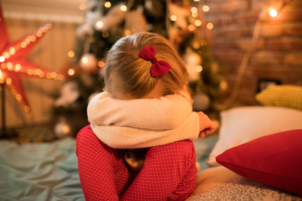 Sad little girl at Christmas