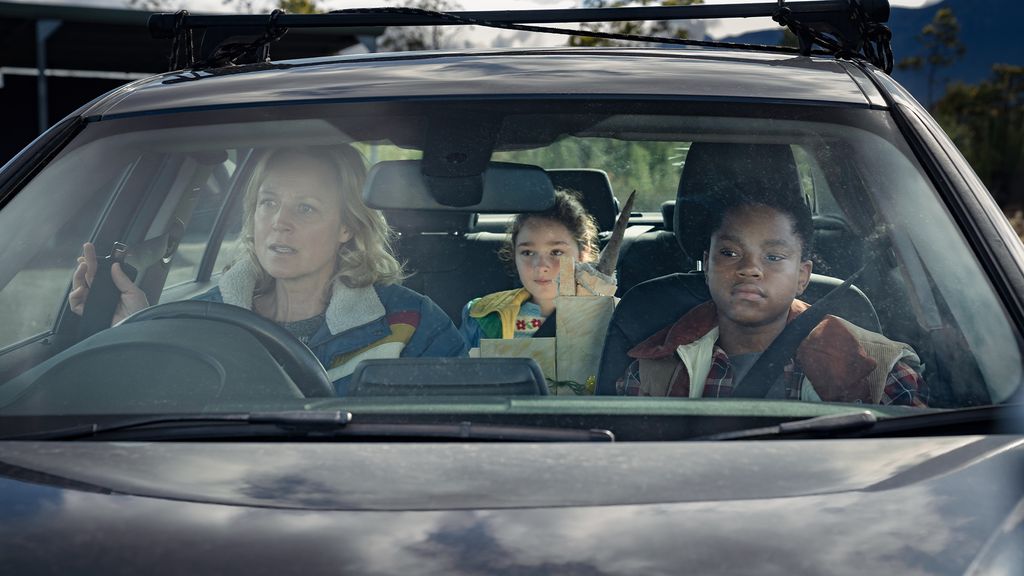 woman and children in car