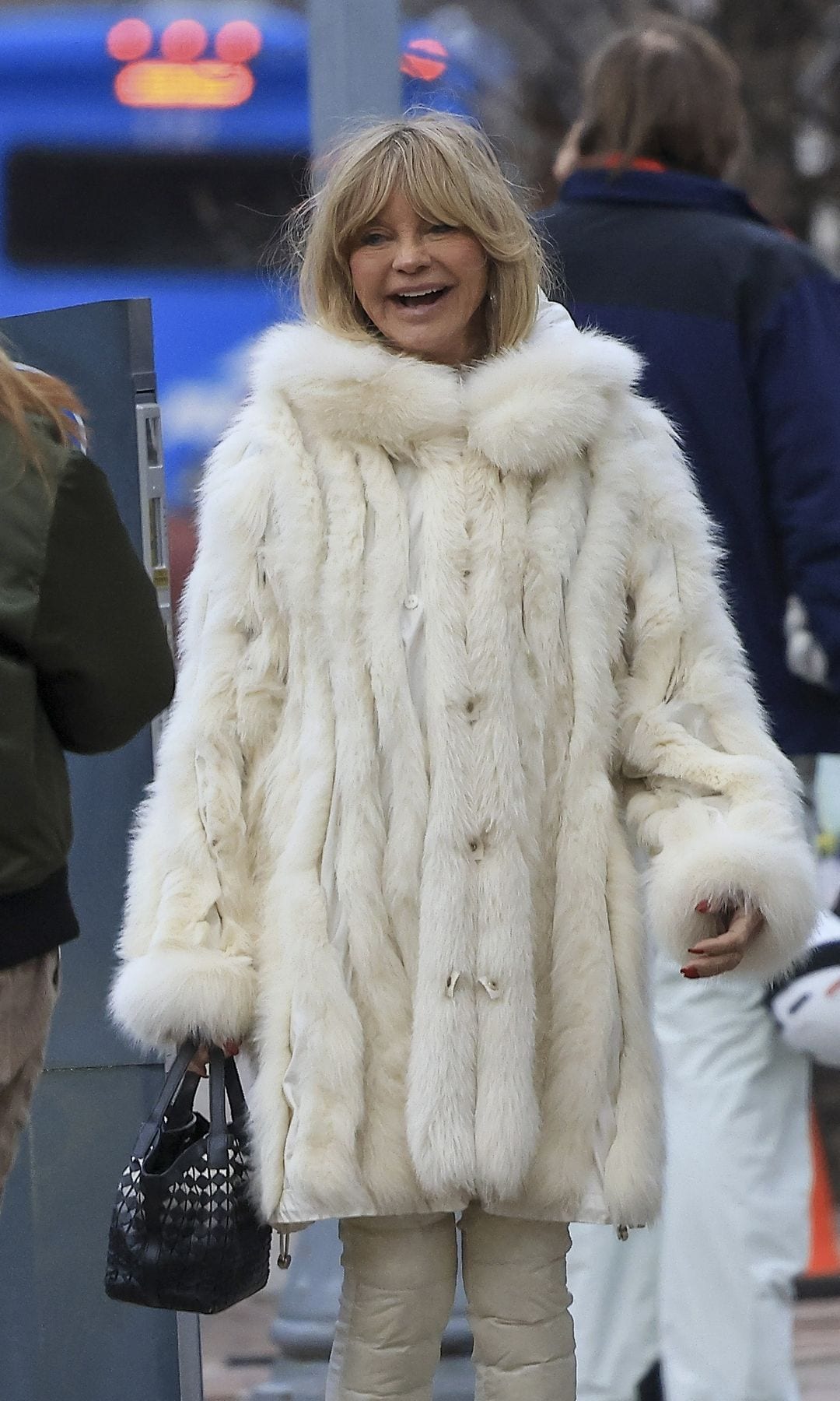 Hawn wore a white fur coat for the occasion