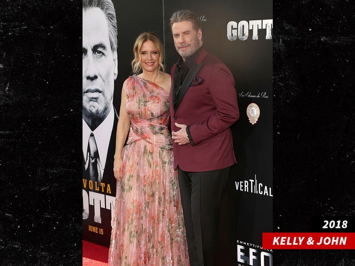 kelly preston john travolta sub getty swipe