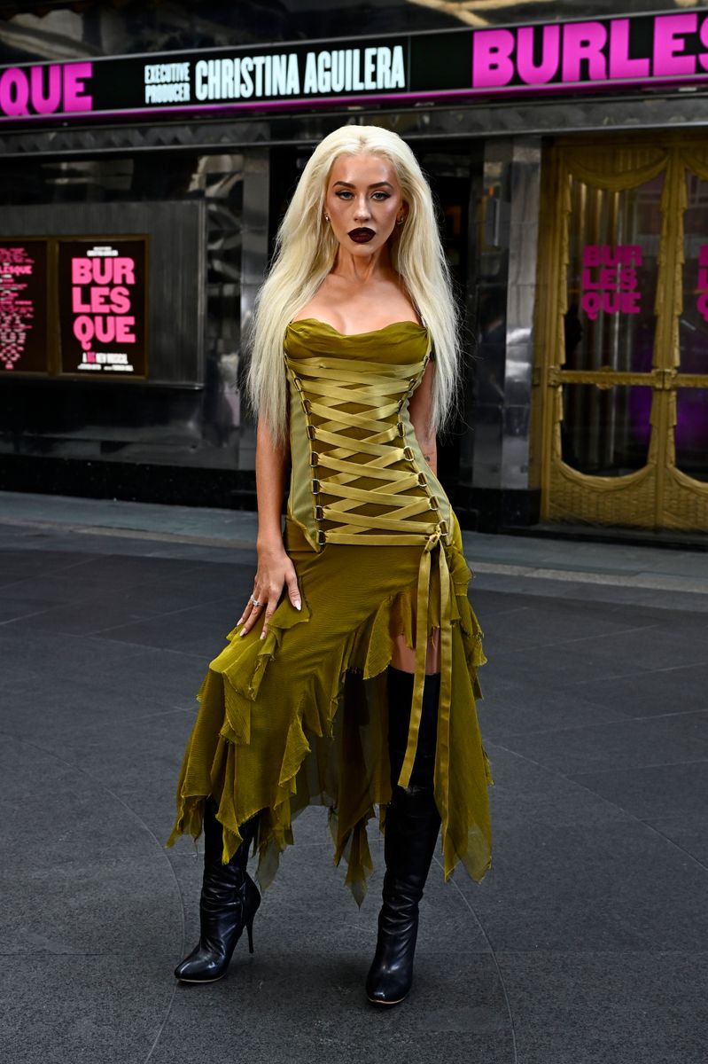 Christina Aguilera attends a photocall for "Burlesque: The Musical" at The Savoy Theatre on July 21, 2025 in London, England