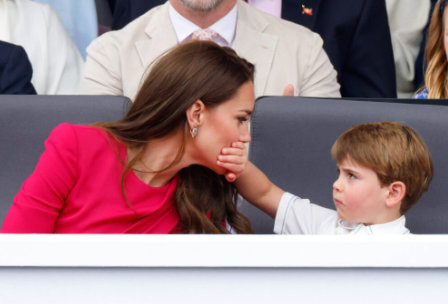 Prince Louis covering Princess Kate's mouth