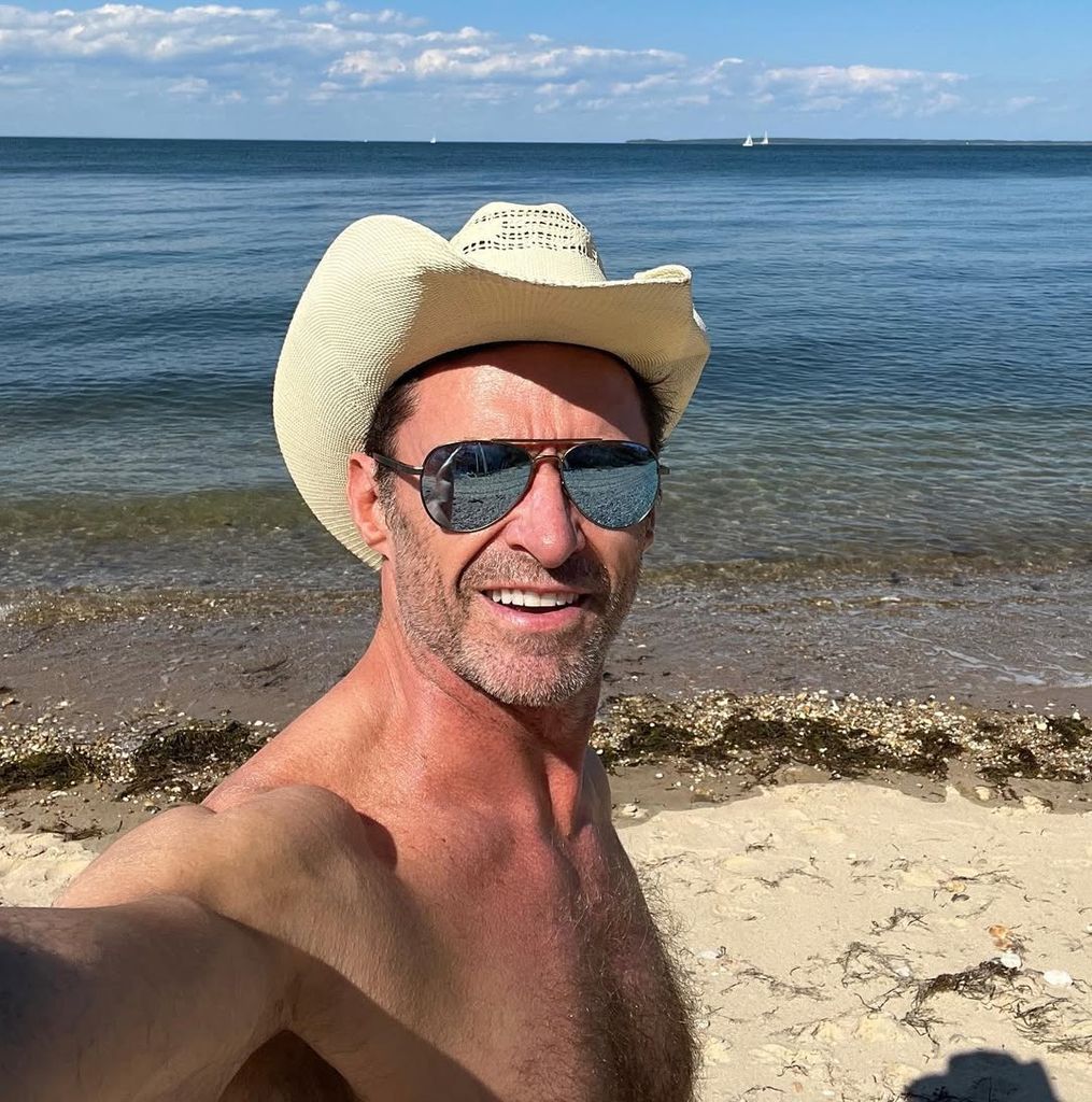 hugh jackman shirtless beach selfie hat