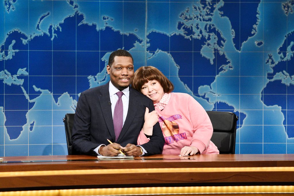 SATURDAY NIGHT LIVE -- "Amy Schumer" Episode 1745 -- Pictured: (l-r) Michael Che, Melissa McCarthy as Michael's Step-Mom during "Weekend Update" in Studio 8H on Saturday, May 12, 2018