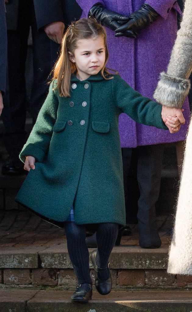 princess charlotte performing curtsy on steps 