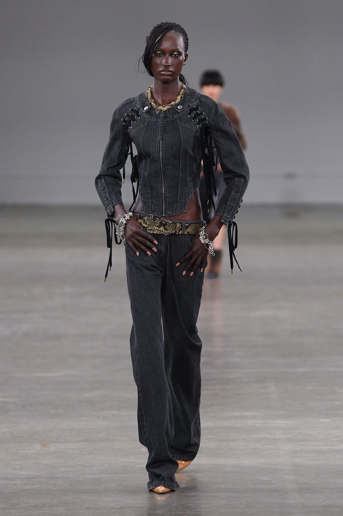 Model on the runway at KNWLS RTW Fall 2024 as part of London Ready to Wear Fashion Week held at The Truman Brewery on February 19, 2024 in London, England.