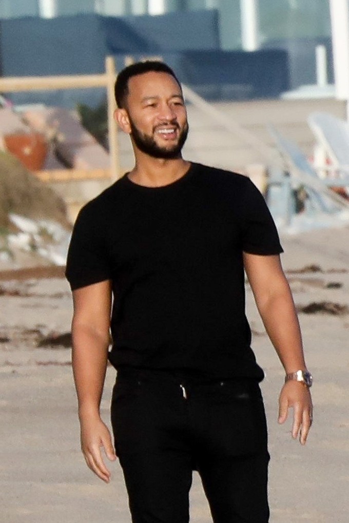 John Legend on the beach in Malibu