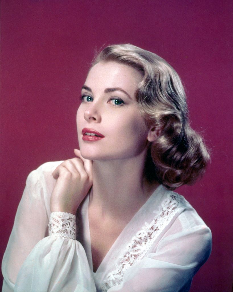 American actress Grace Kelly (1929 - 1982) in a lace-trimmed top, circa 1955. (Photo by Silver Screen Collection/Hulton Archive/Getty Images)