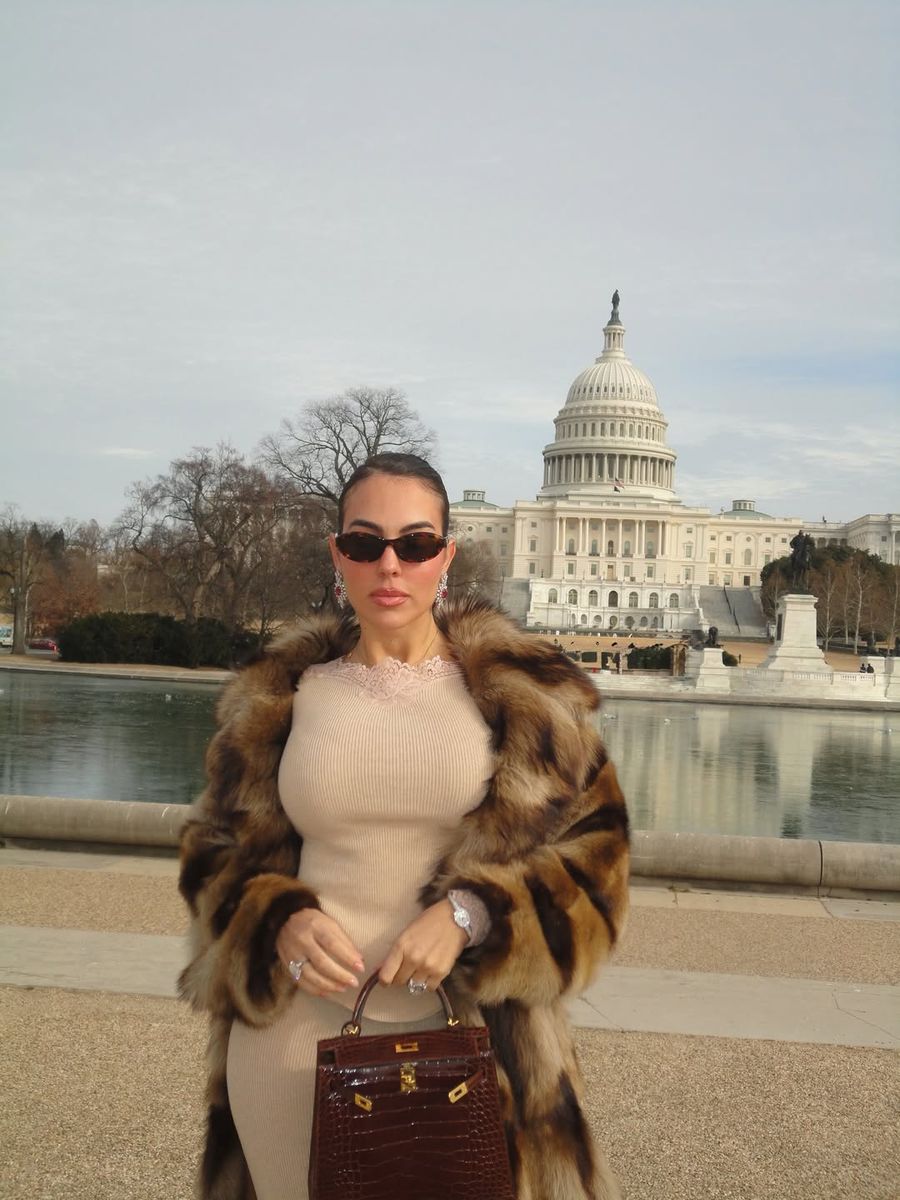 Rodriguez wore a cream colored outfit as she explored through the city