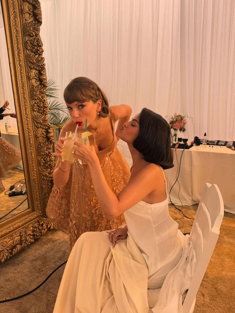 Taylor Swift and Selena Gomez sipping drinks at Selena's wedding 