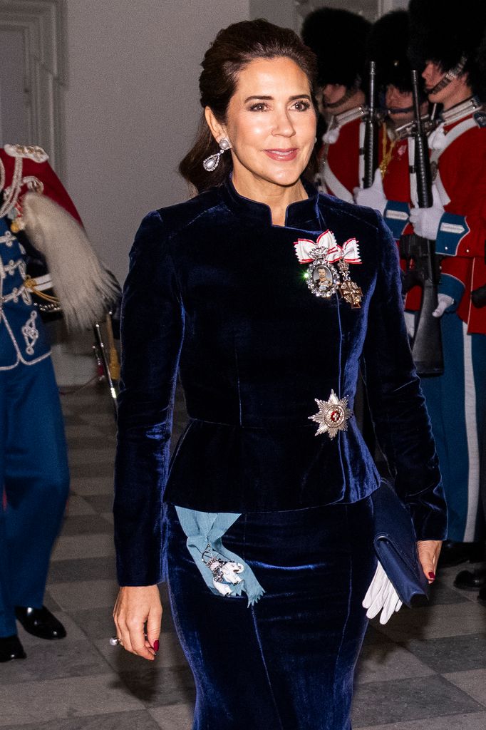 Queen Mary wearing velvet dress and honours