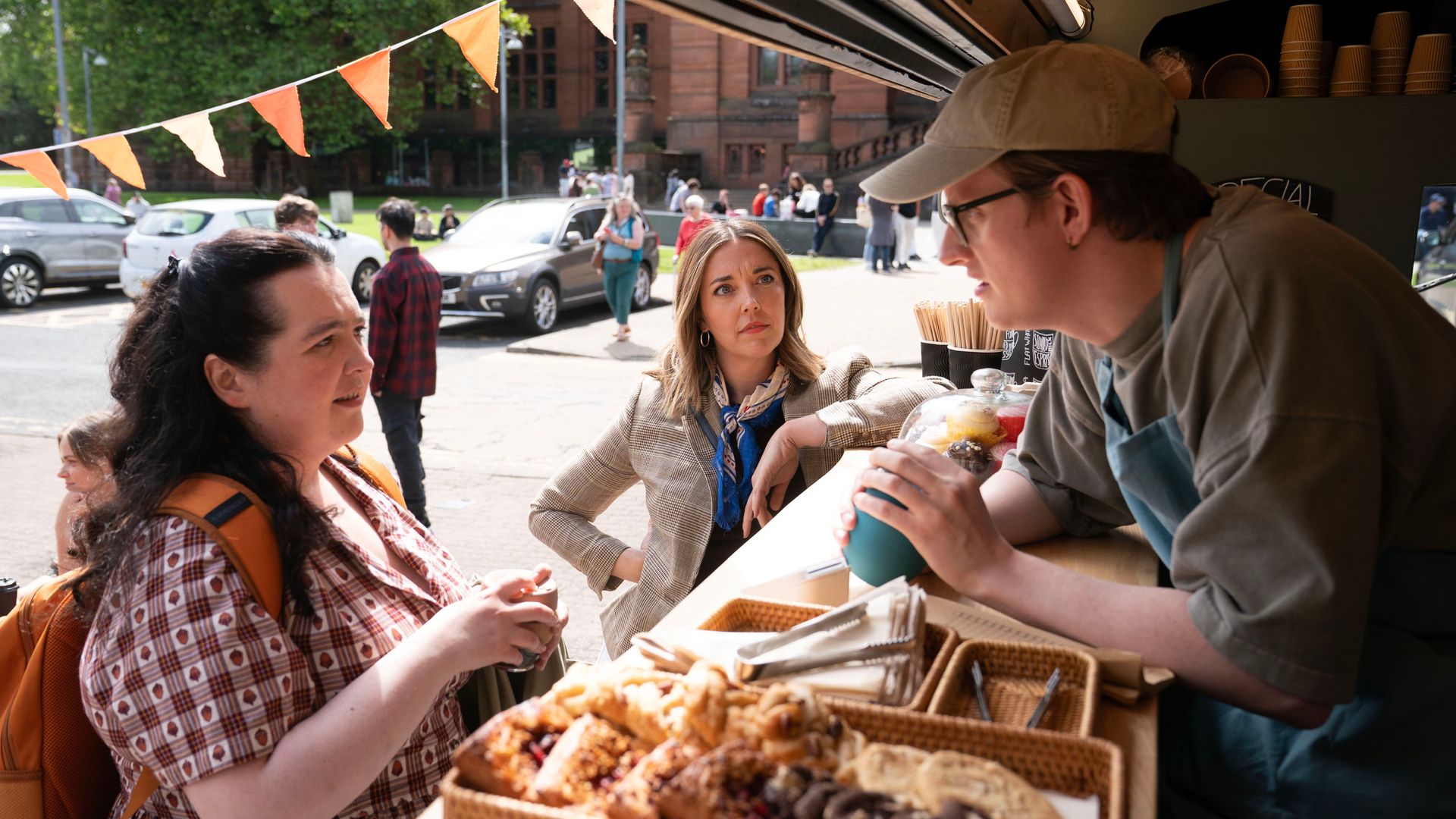 Ashley Storrie, Maddie Rice and Lorn Macdonald in a still from Dinosaur