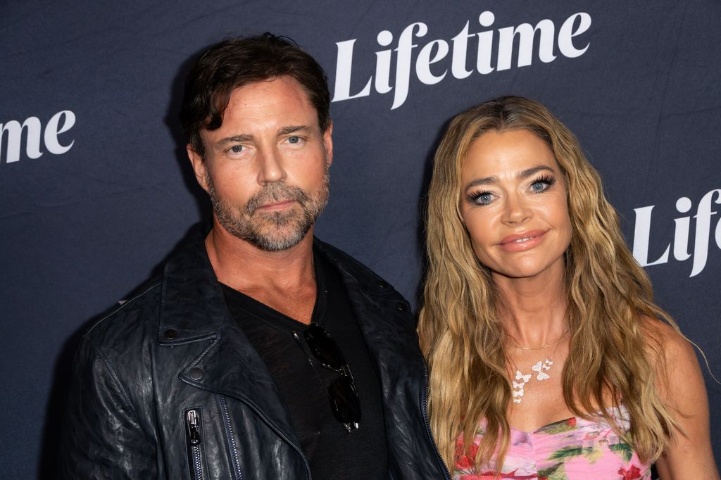 Aaron Phypers and Denise Richards at the Terry McMillan Presents: "Tempted by Love" Los Angeles Premiere held at the IPIC Theaters on August 8, 2024 in Westwood, California