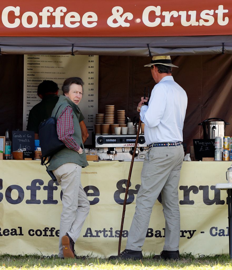 Princess Anne, Princess Royal and husband Sir Tim Laurence queue up at at pop-up coffee shop 