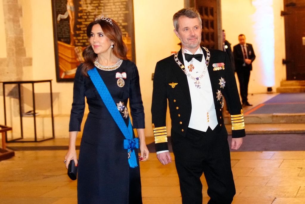 King Frederik X of Denmark (R) and Queen Mary of Denmark attend a state banquet with a concert at St. Nicholas Church in Tallinn, Estonia