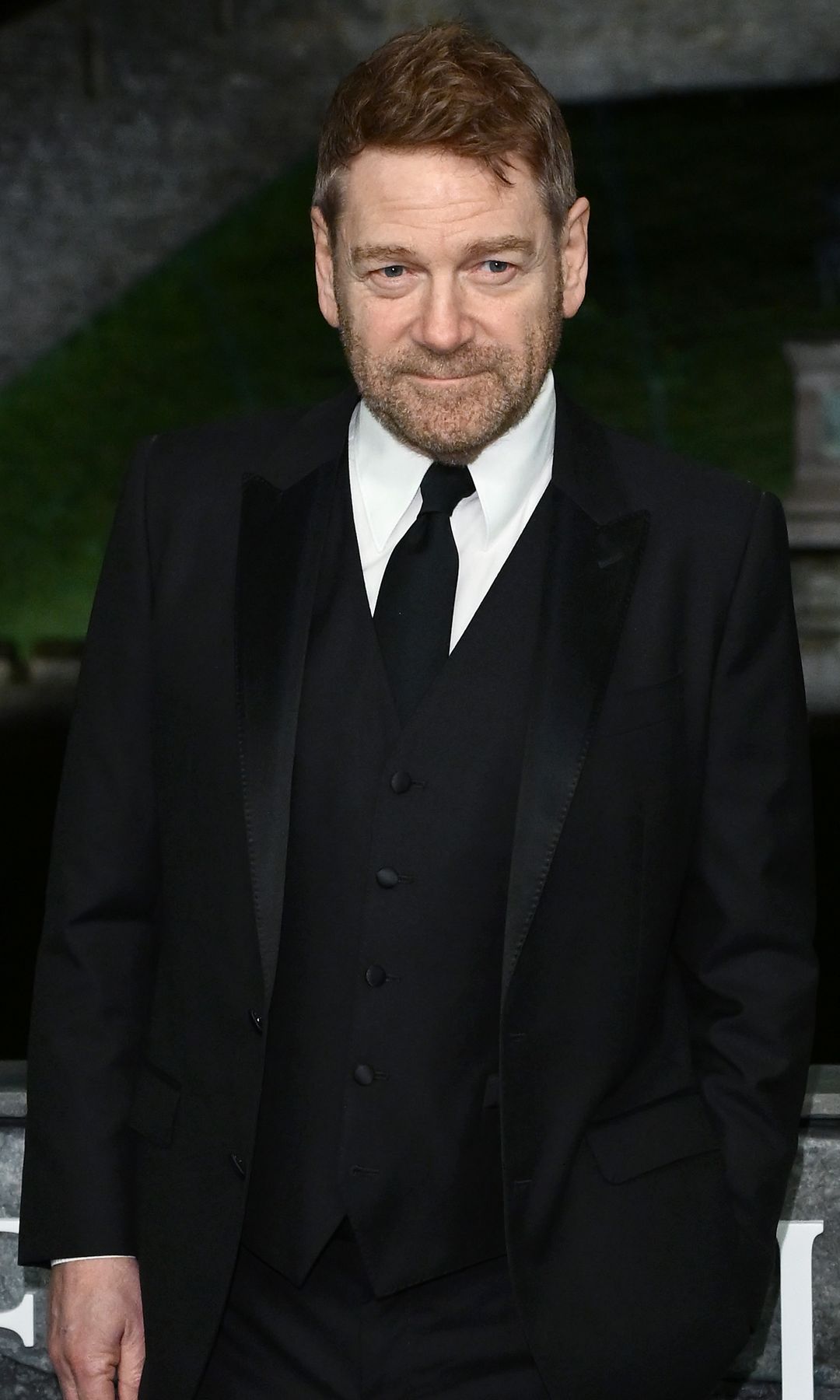 Kenneth Branagh in a black suit