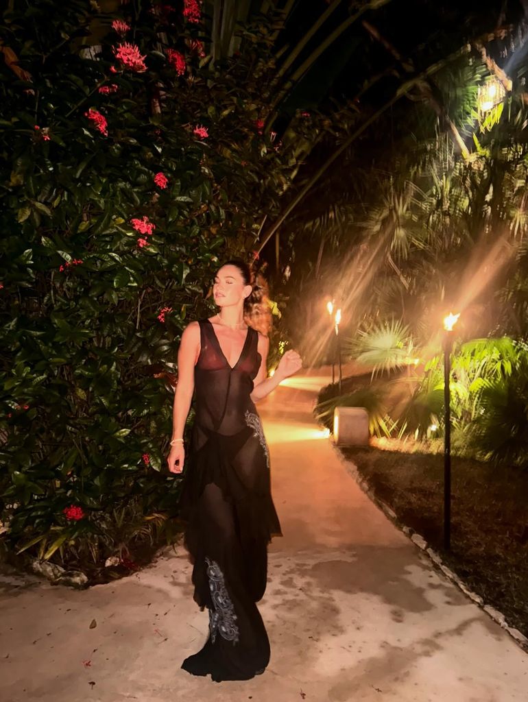 A photo of Lily James wearing a black dress 