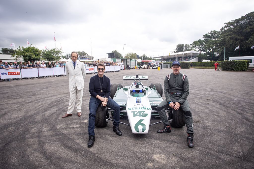 Lord March, Tom Cruise and Wade Eastwood pose for a photo during the Goodwood Festival of Speed at Goodwood on July 11, 2021 in Chichester, England.