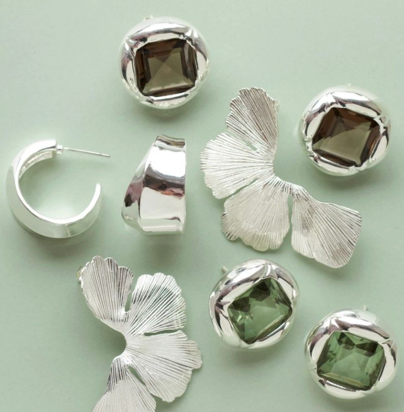 Make a statement with bold silver earrings