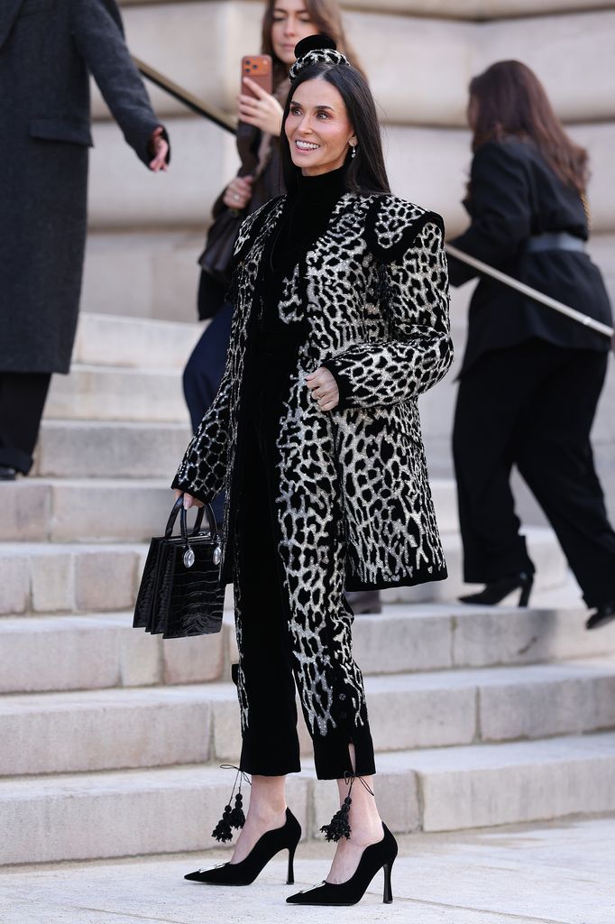 Demi Moore in leopard print outfit at the Schiaparelli Haute Couture show
