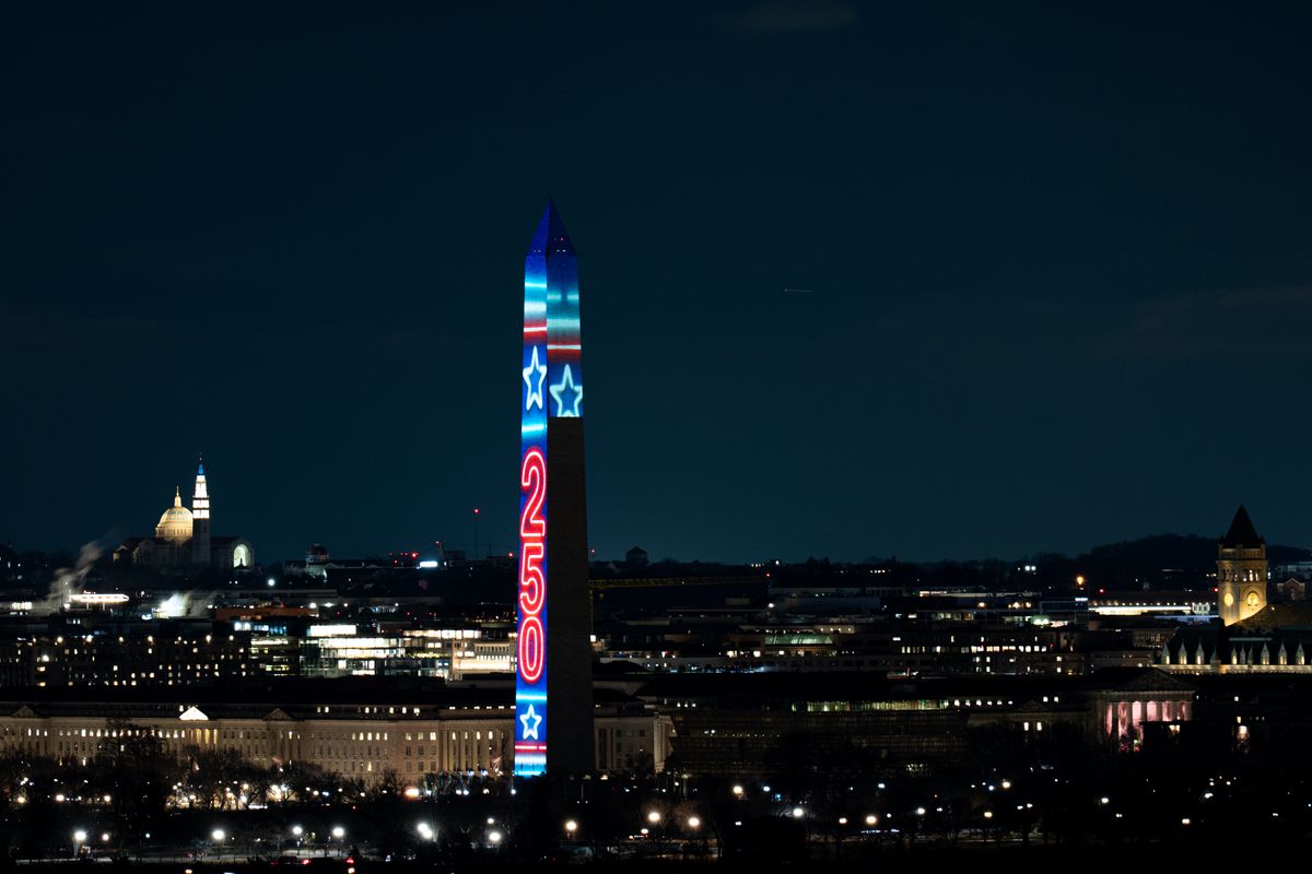 UNITED STATES - DECEMBER 30: Testing of the Freedom 250 projections lights up the Washington Monument in Washington on Tuesday, December 30, 2025. On New Year's Eve the Washington Monument will feature a four-sided projection light show starting at 7 p.m. plus fireworks at midnight as the official kickoff for the 250th anniversary of the United States in 2026. (Bill Clark/CQ-Roll Call, Inc via Getty Images)