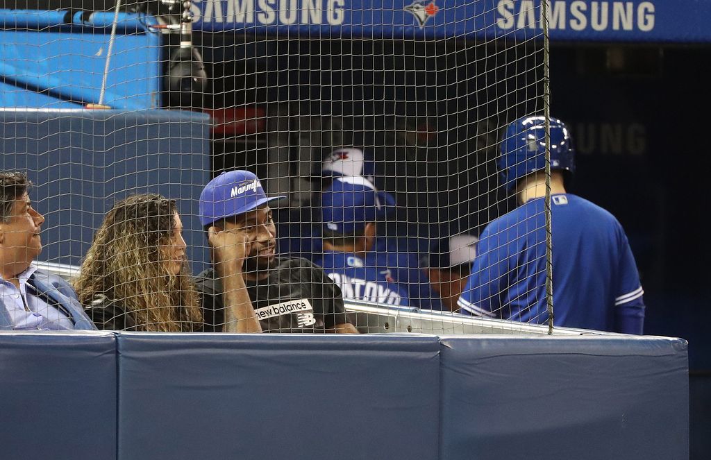Kishele Shipley and Kawhi Leonard at a Toronto Blue Jays game