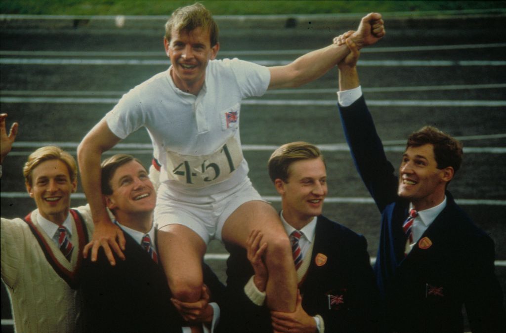 Ian Charleston being lifted into the air in a scene from Chariots of Fire
