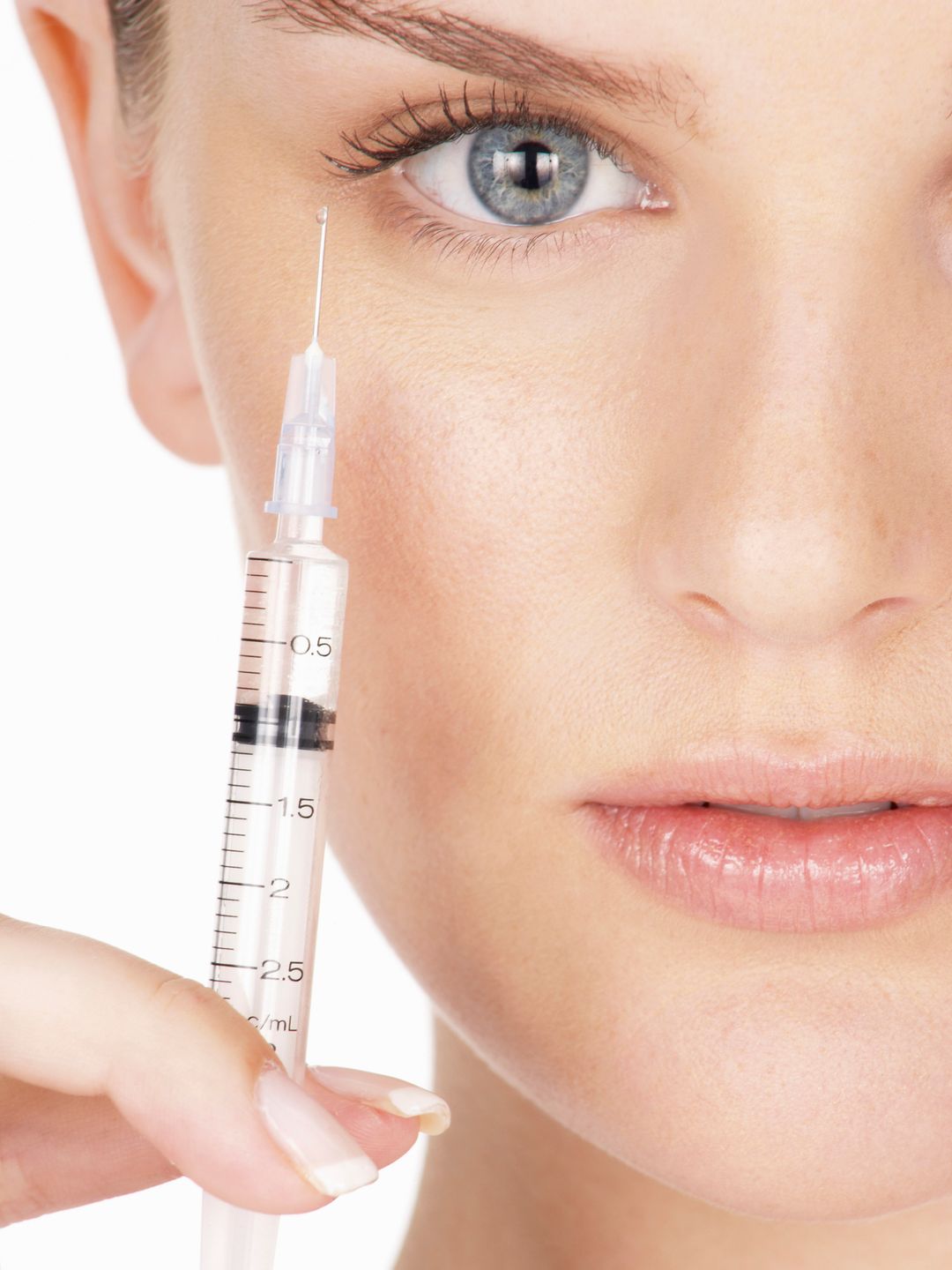 Woman with a needle by her face