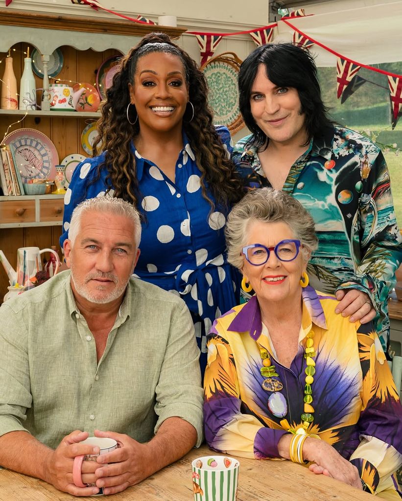 Four people pose for a picture