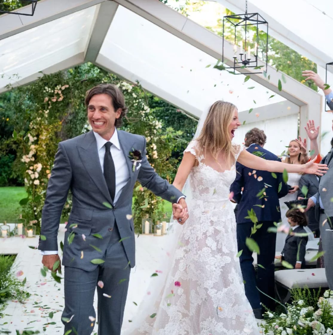Gwyneth Paltrow’s 2018 wedding to Brad Falchuk included a lace A-line gown with cap sleeves, sheer detailing, and a keyhole-cutout back. 