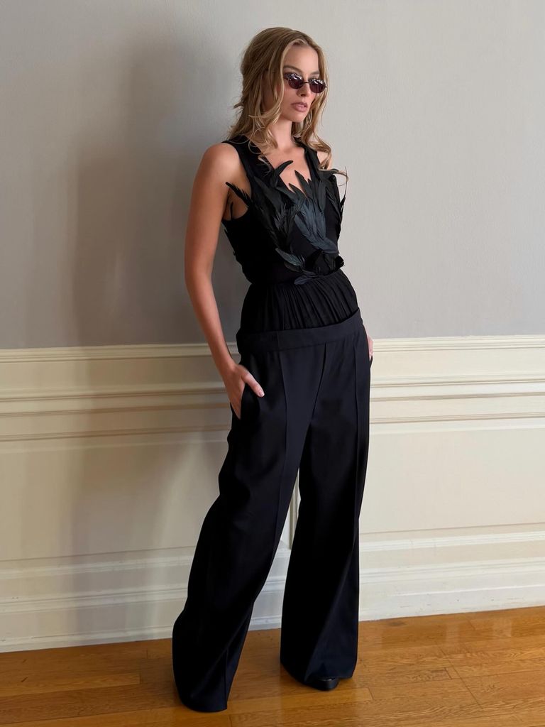 Margot Robbie poses in a Victoria Beckham trouser and top 
