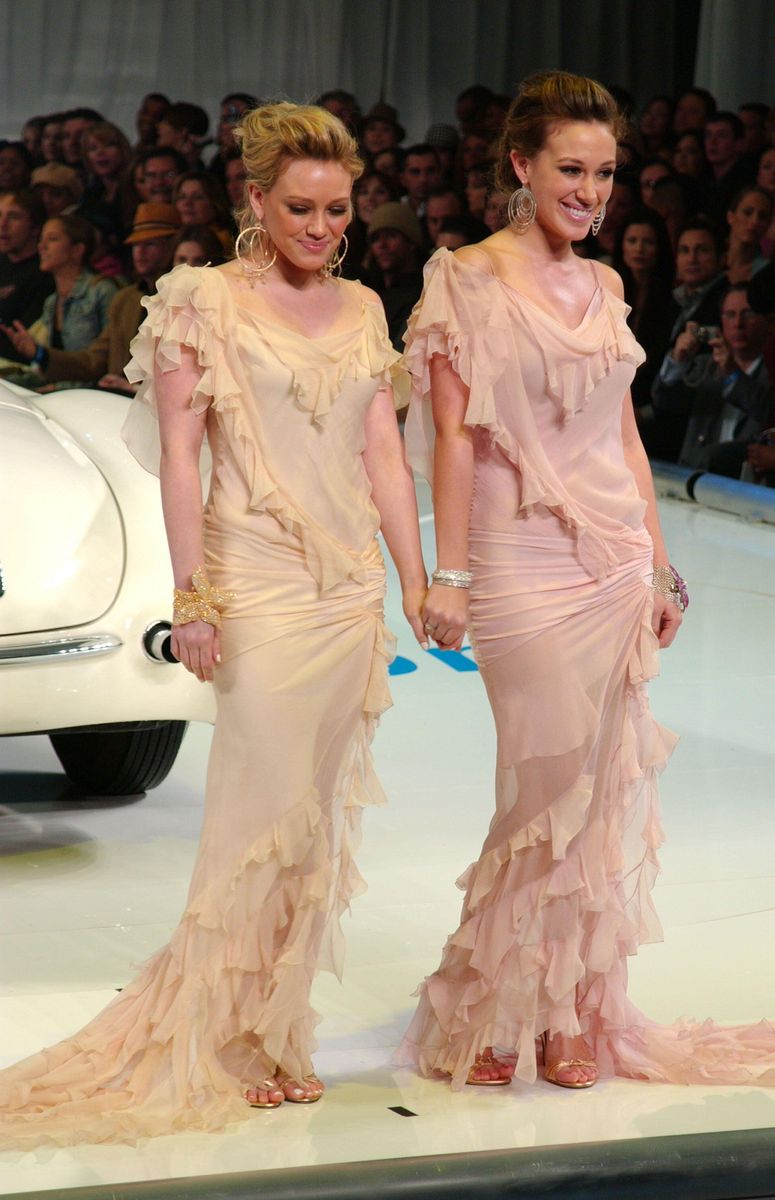 Haylie and Hilary Duff at the 4th Annual GM "Ten" Fashion Show held on Vine and Sunset under a tent. The Charity event showcases top celebritiies wearing high fashion paired with the newest GM cars (including concept and custom cars). Los Angeles - 22 