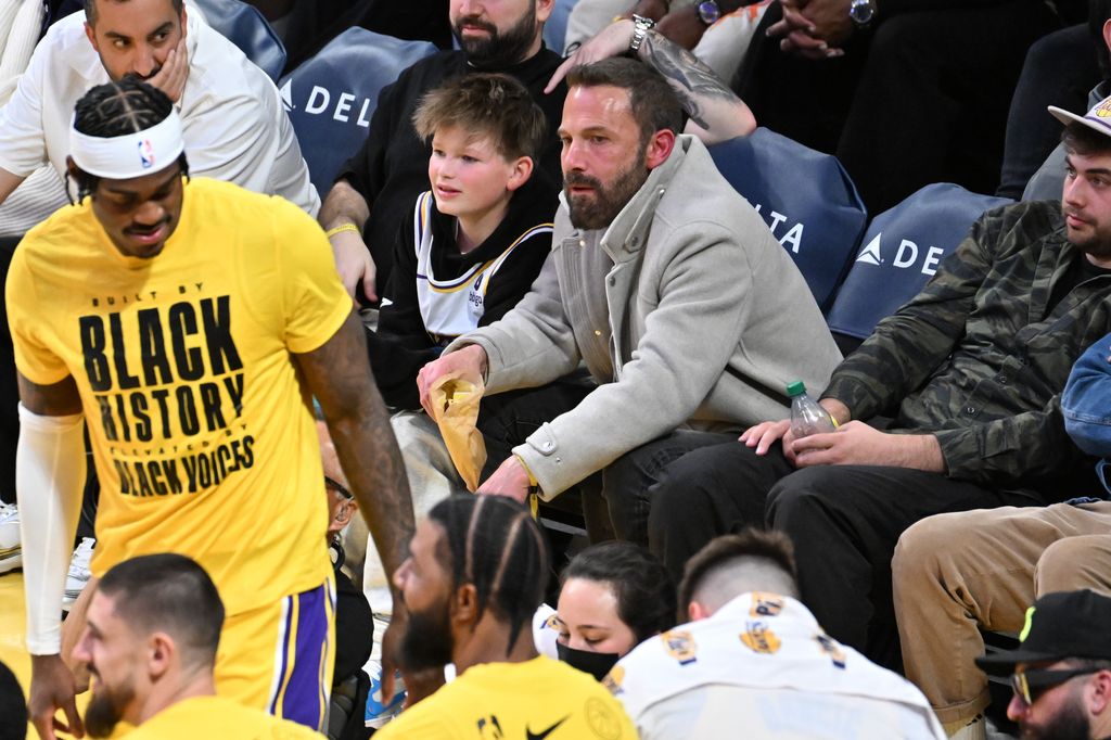 Ben Affleck (R) and Samuel Garner Affleck attend a basketball game between the Los Angeles Lakers and the Minnesota Timberwolves at Crypto.com Arena on February 27, 2025
