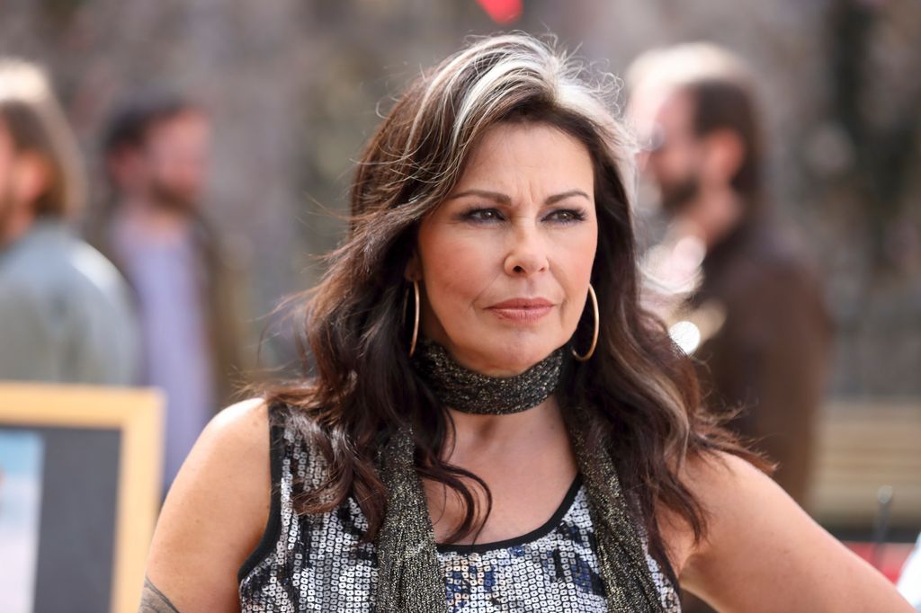 close-up woman with black and white hair