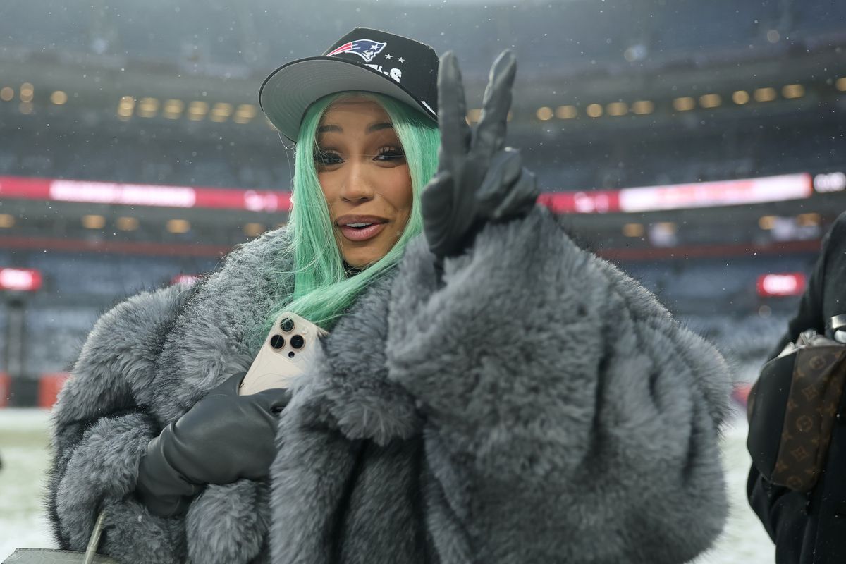 Artist Cardi B poses for a photo following the AFC Championship Playoff game against the Denver Broncos at Empower Field At Mile High on January 25, 2026 in Denver, Colorado. The New England Patriots defeat the Denver Broncos 10-7. (Photo by Matthew Stockman/Getty Images)