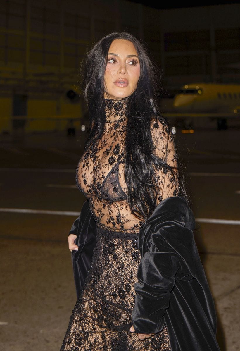 Kim Kardashian stuns in a lace catsuit and dramatic cape amid Lewis Hamilton romance rumors
