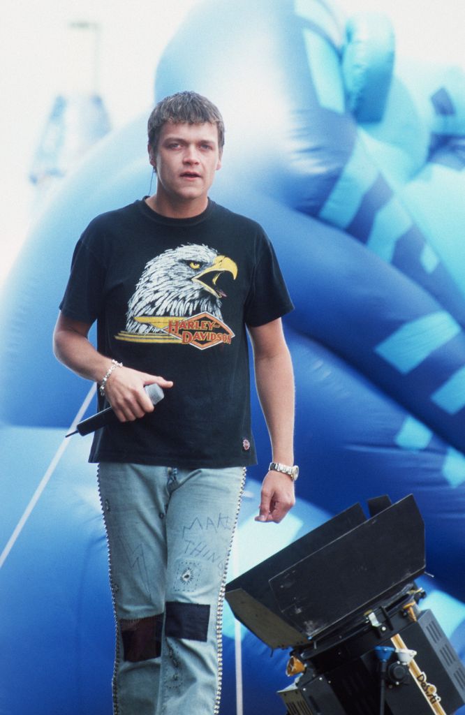Brad Arnold on stage with 3 Doors Down in 2001