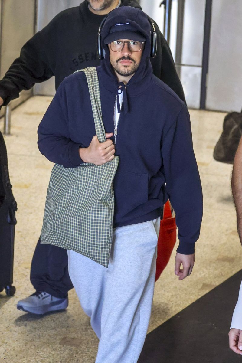 Before taking the stage in Sydney this weekend, global superstar Bad Bunny was spotted soaking up the sun in Australia alongside longtime love Gabriela Berlingeri.