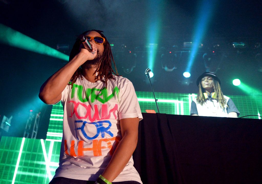  Rapper Lil Jon (L) and Nathan Smith aka DJ Young Slade perform onstage during 97.1 AMP RADIO's Amplify 2014 concert at the Hollywood Palladium on March 22, 2014 in Hollywood, California