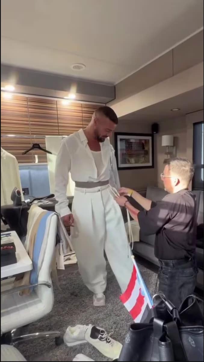 Ricky Martin's final wardrobe adjustments for the Super Bowl show